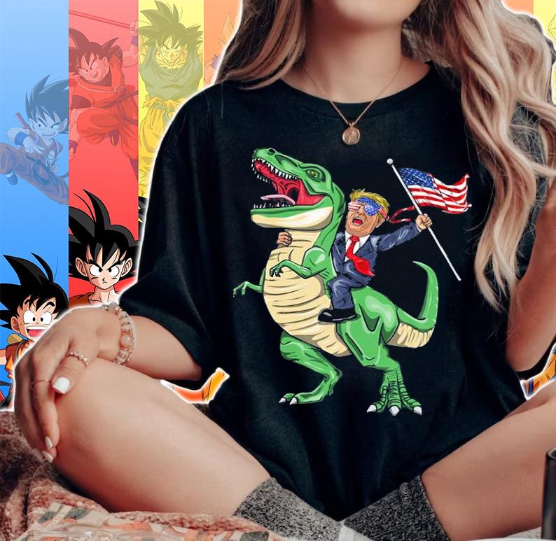 Donald Trump Riding A Dinosaur With American Flag T-Shirt woman shirt
