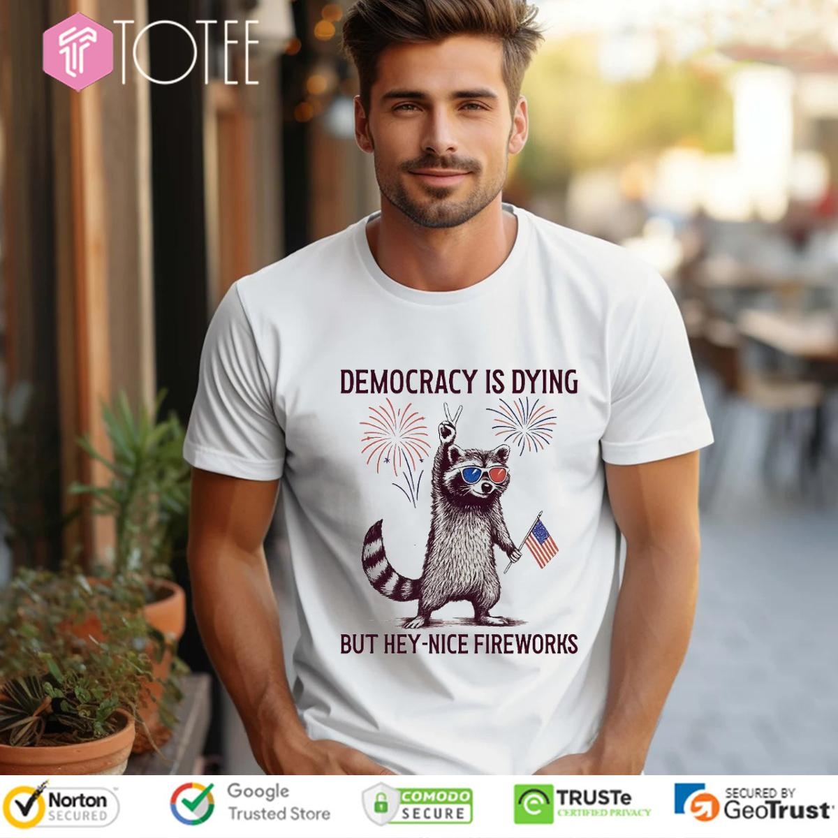 Raccoon Hold Usa Flag Democracy Is Dying But Hey Nice Fireworks 4Th Of July T-shirt
